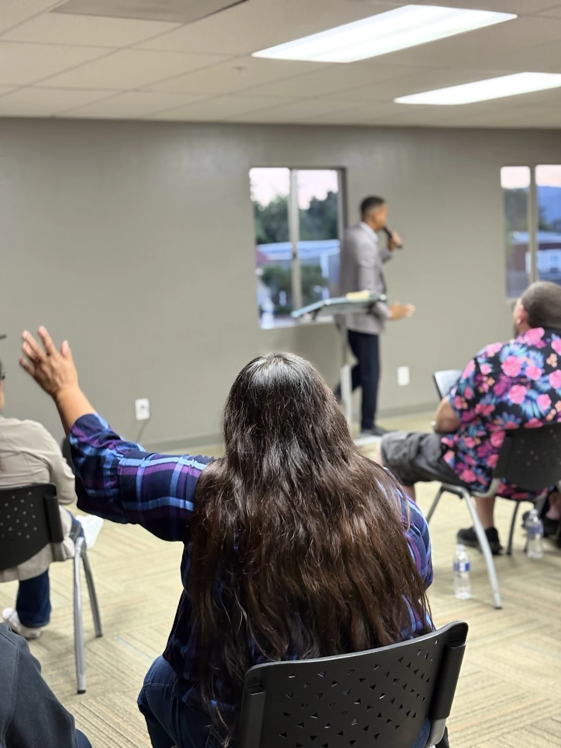 A worshipper responding during a church gathering